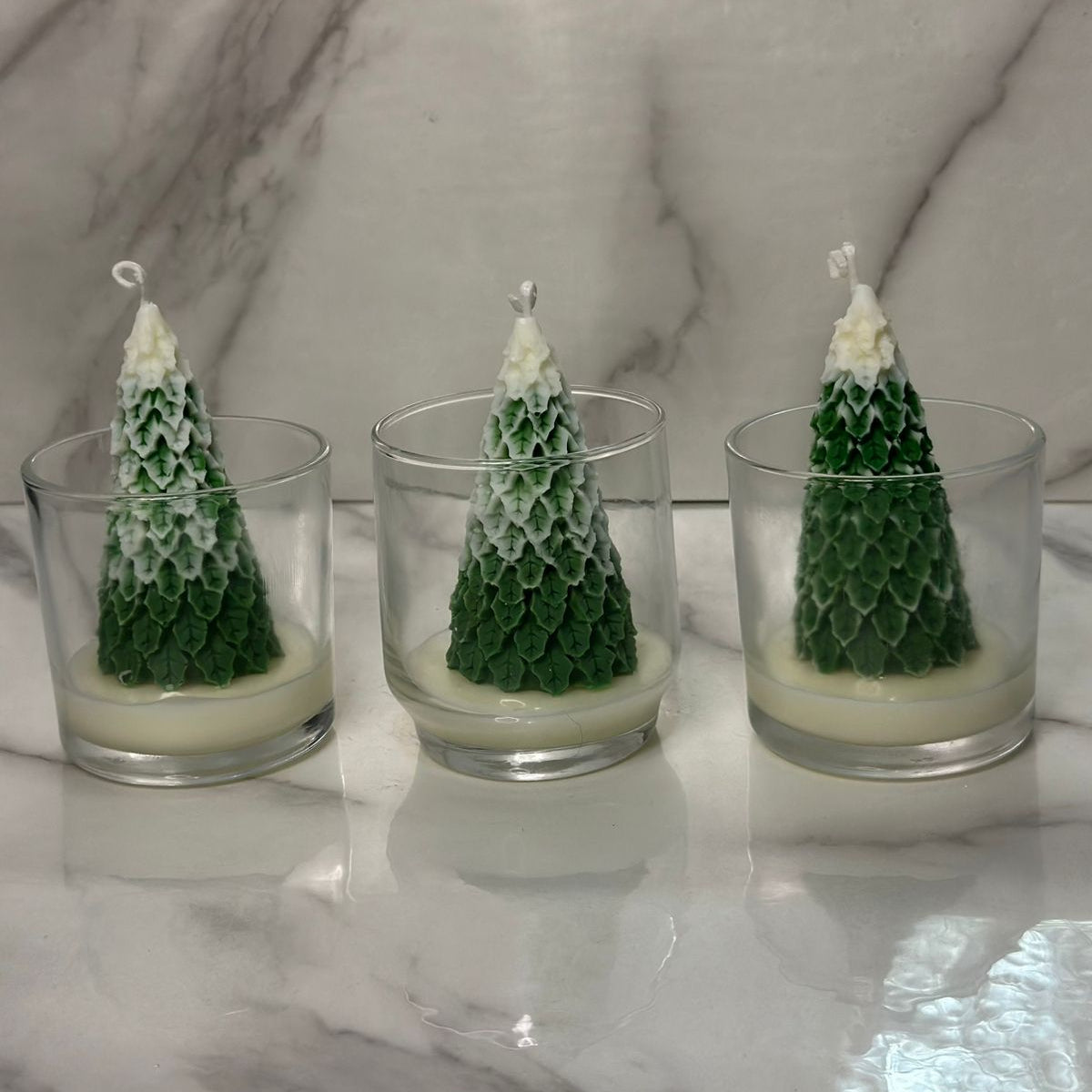 Trio velas de pino en vaso