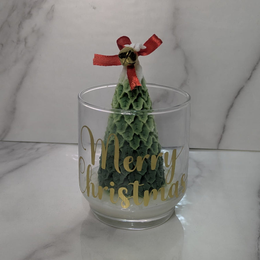 vela en frasco con pino